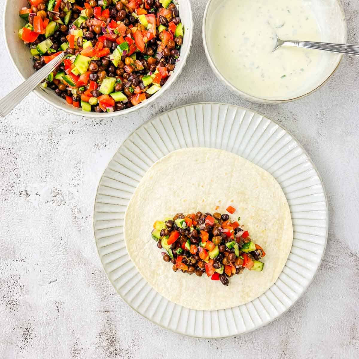 Filling placed on a soft tortilla.