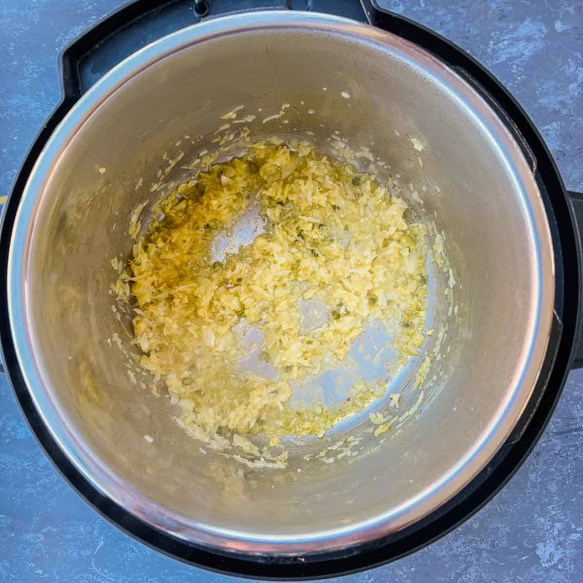 Sauted onion, ginger, garlic in Instant Pot.
