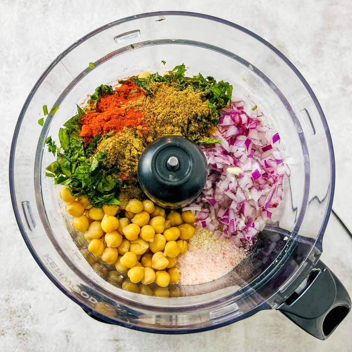 Chickpea nuggets ingredients in food processor.