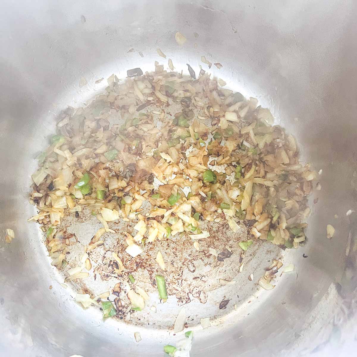 Sauted onion and jalapeno in Instant Pot.