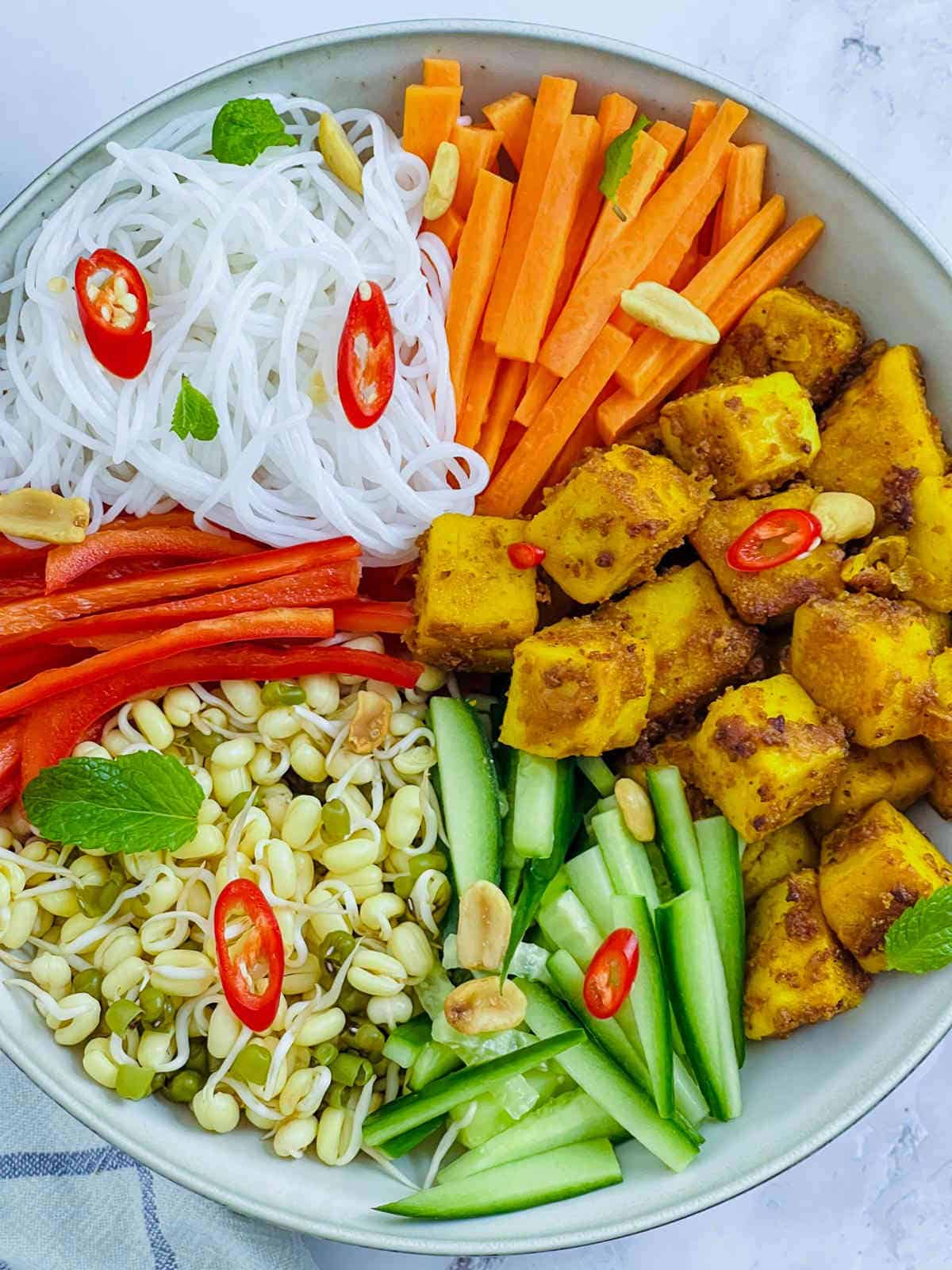 Assembling the Buddha bowl.