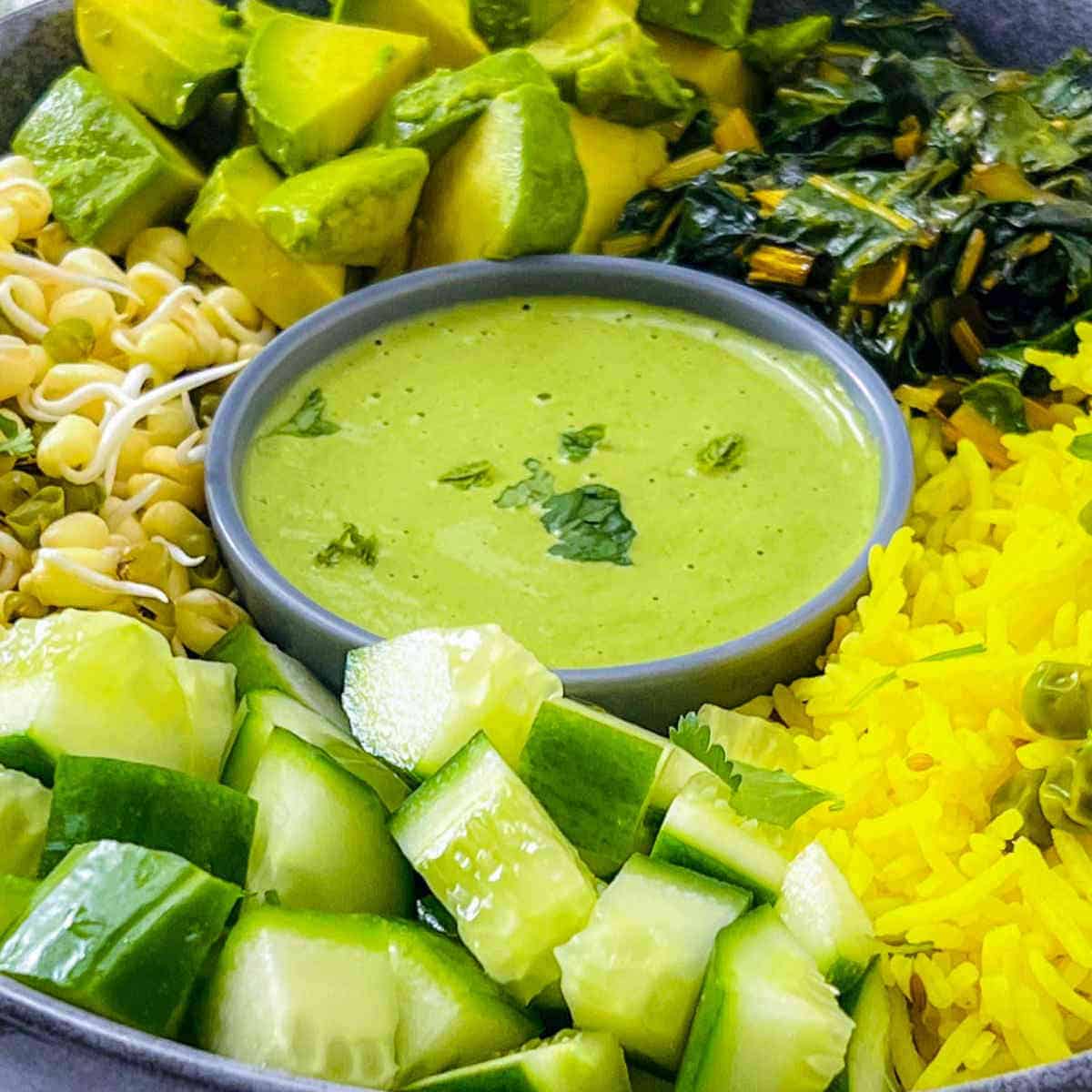 Assembling the green goddess power bowl.