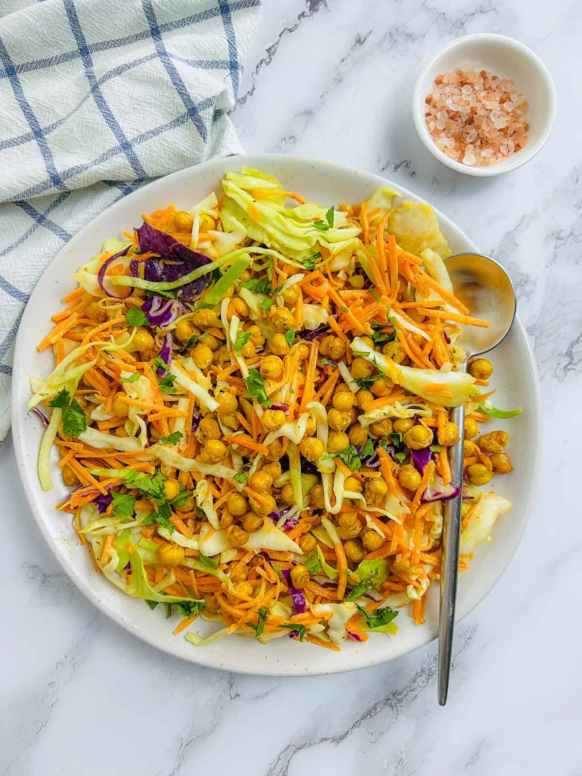 Roasted chickpea crunch salad on a white plate.