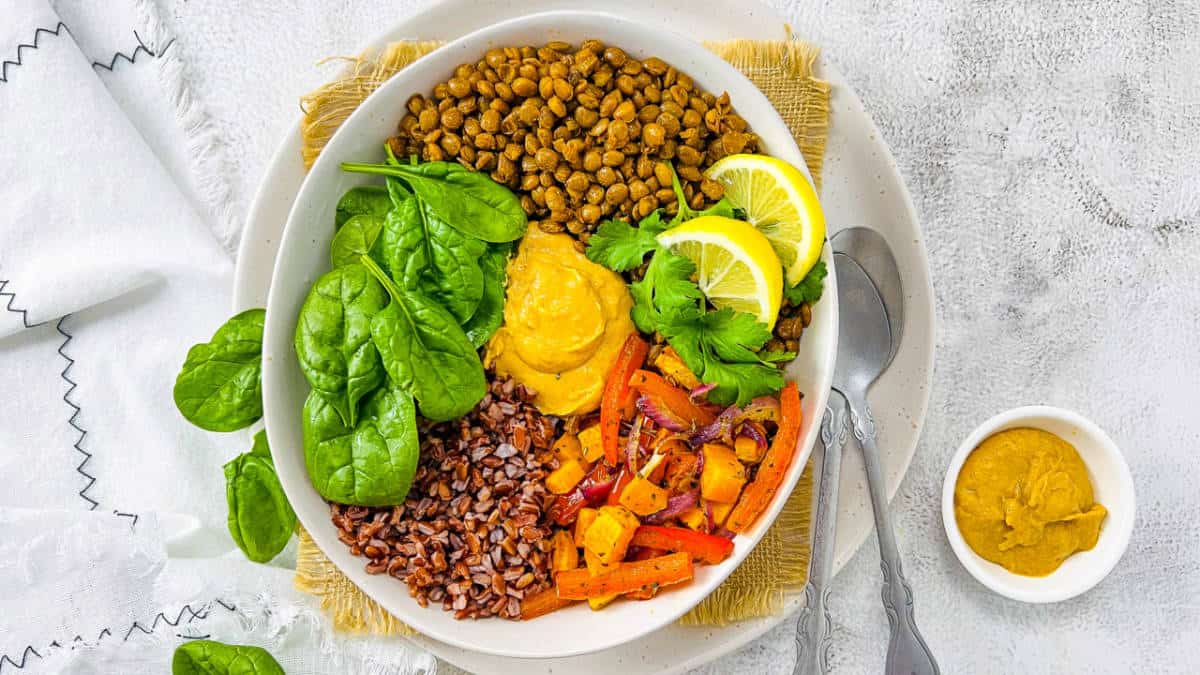 Lentil Buddha bowl on a marble surface.