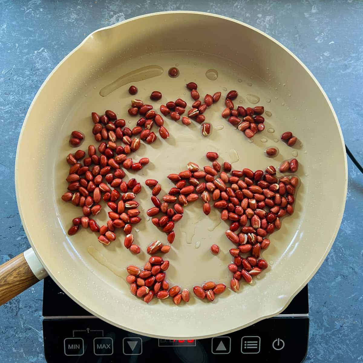 Fried peanuts in a pan.