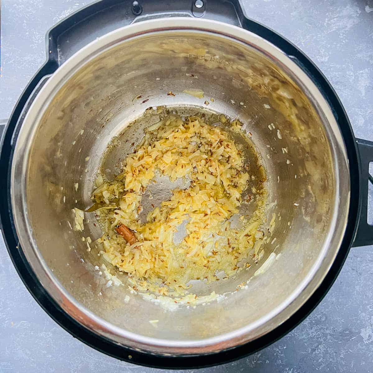 Sauted onion, garlic, and ginger in the Instant Pot.