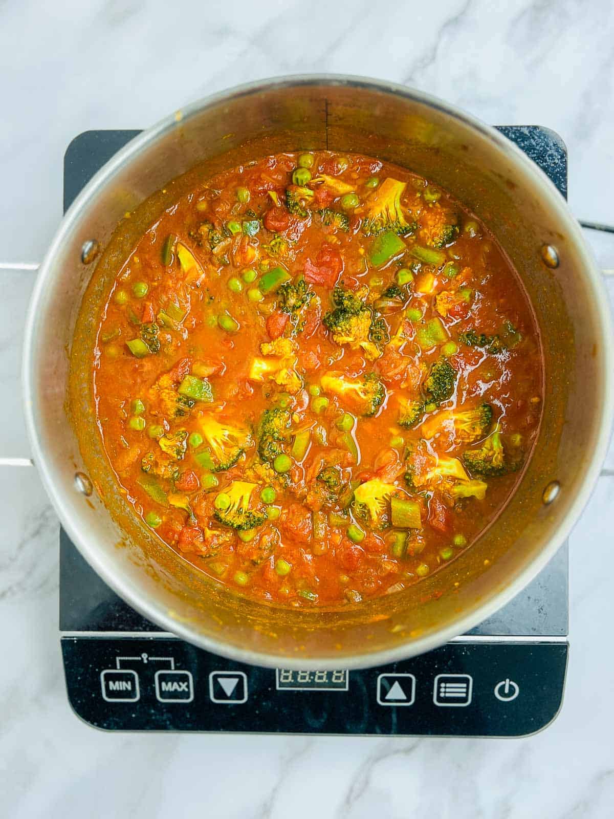 Veggies cooked in onion-tomato base.