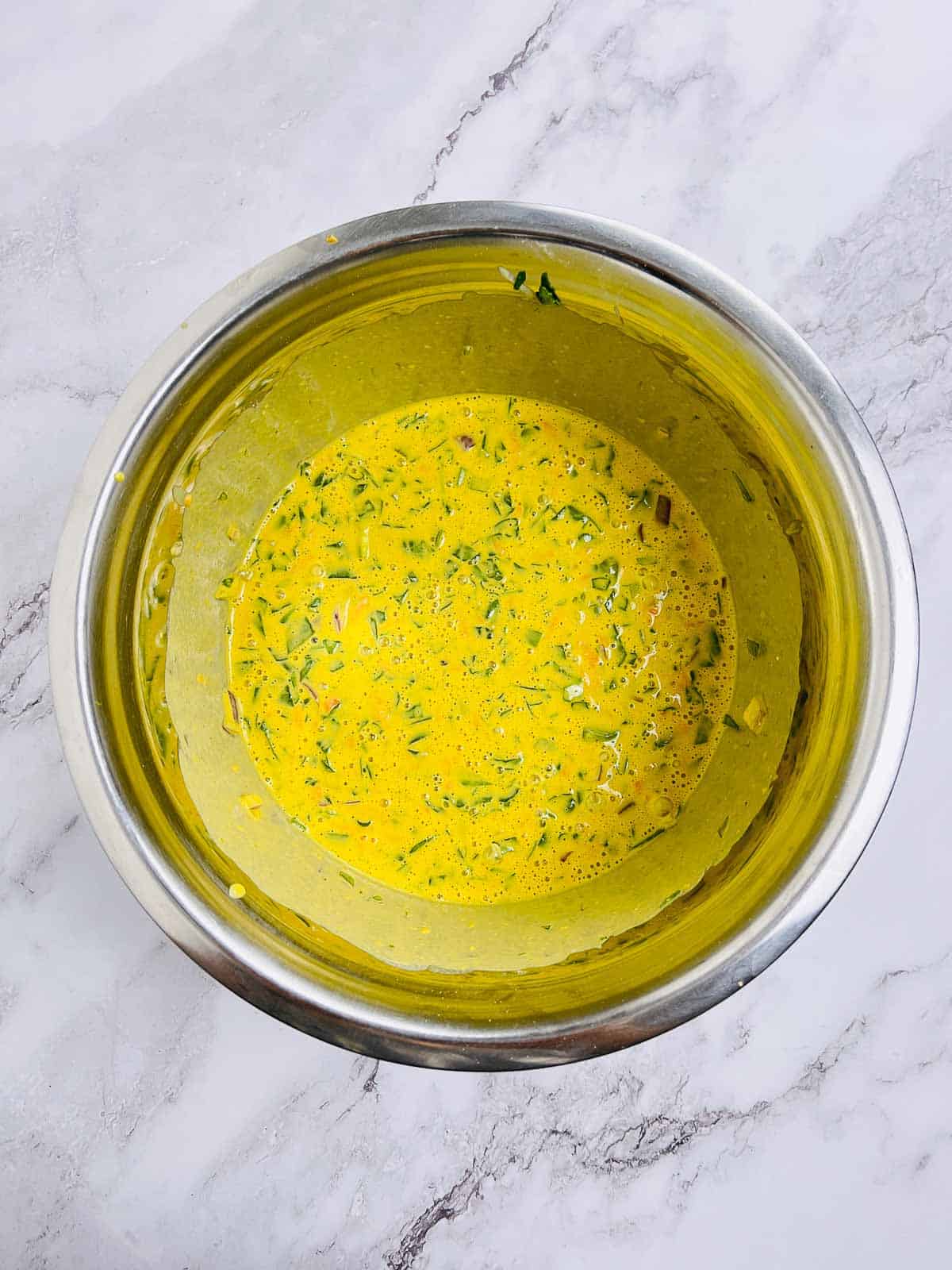 Pancake batter in a large mixing bowl.