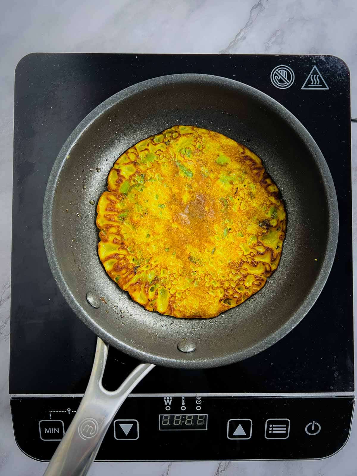 Flip and cook on both sides.
