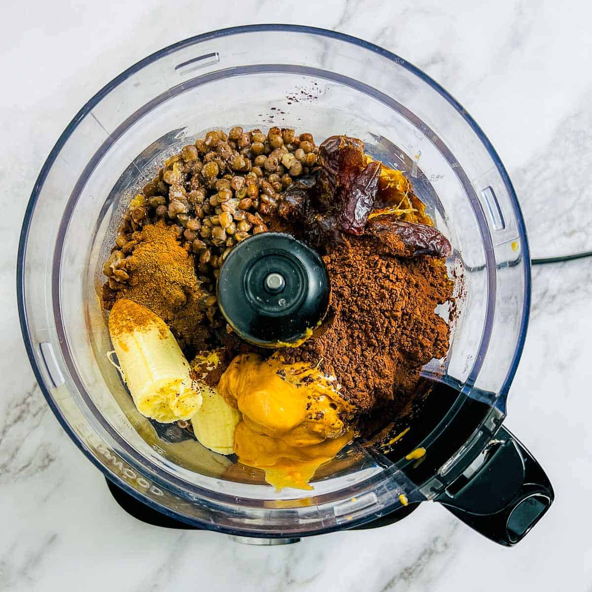 All ingredients except nuts and dried fruits in the food processor.