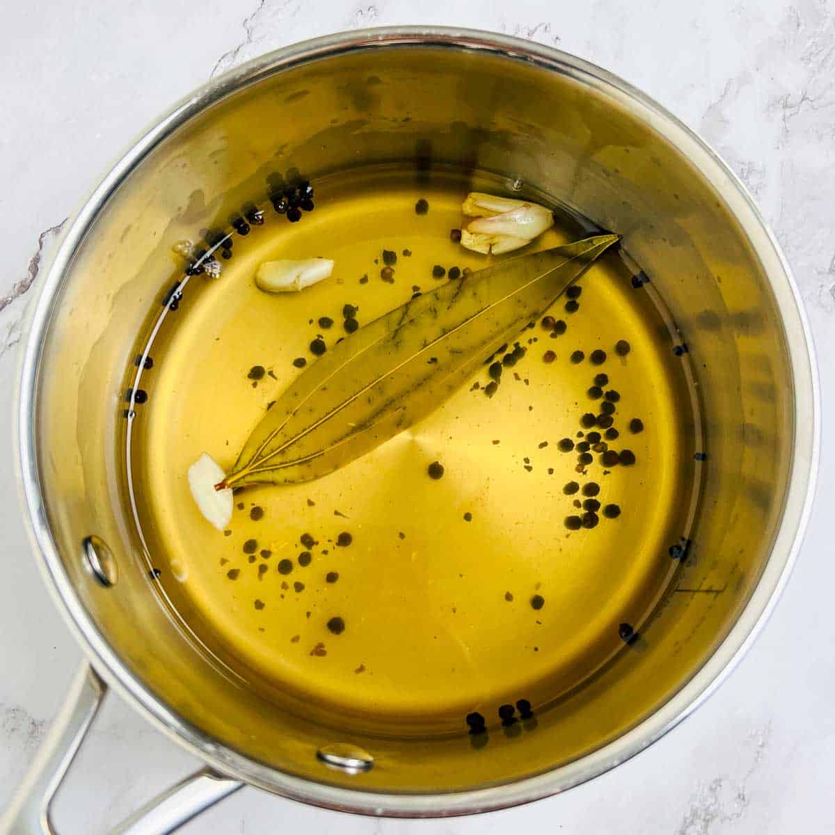 Pickling brine in a saucepan.
