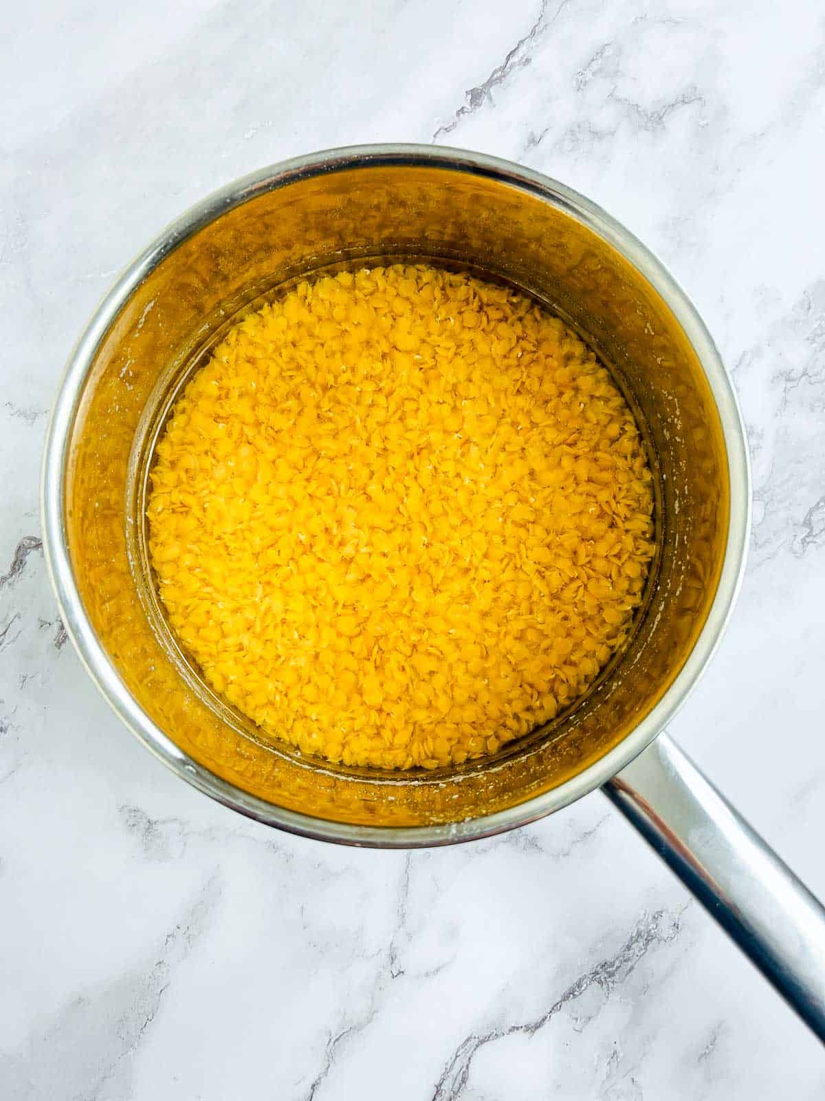 Boiled lentils in a saucepan.