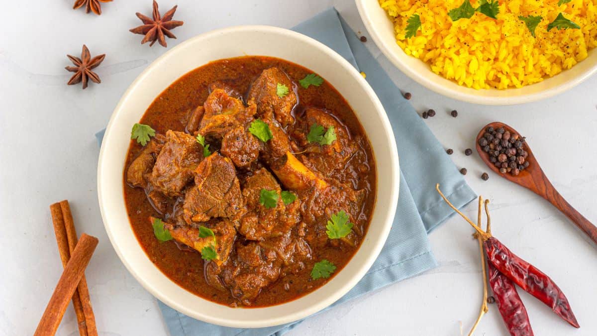 Mutton vindaloo served with saffron rice.