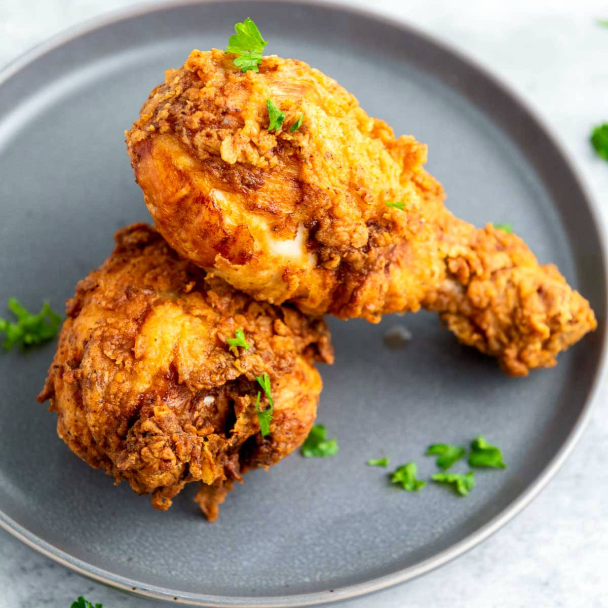 Chicken drumsticks deep fried in oil.