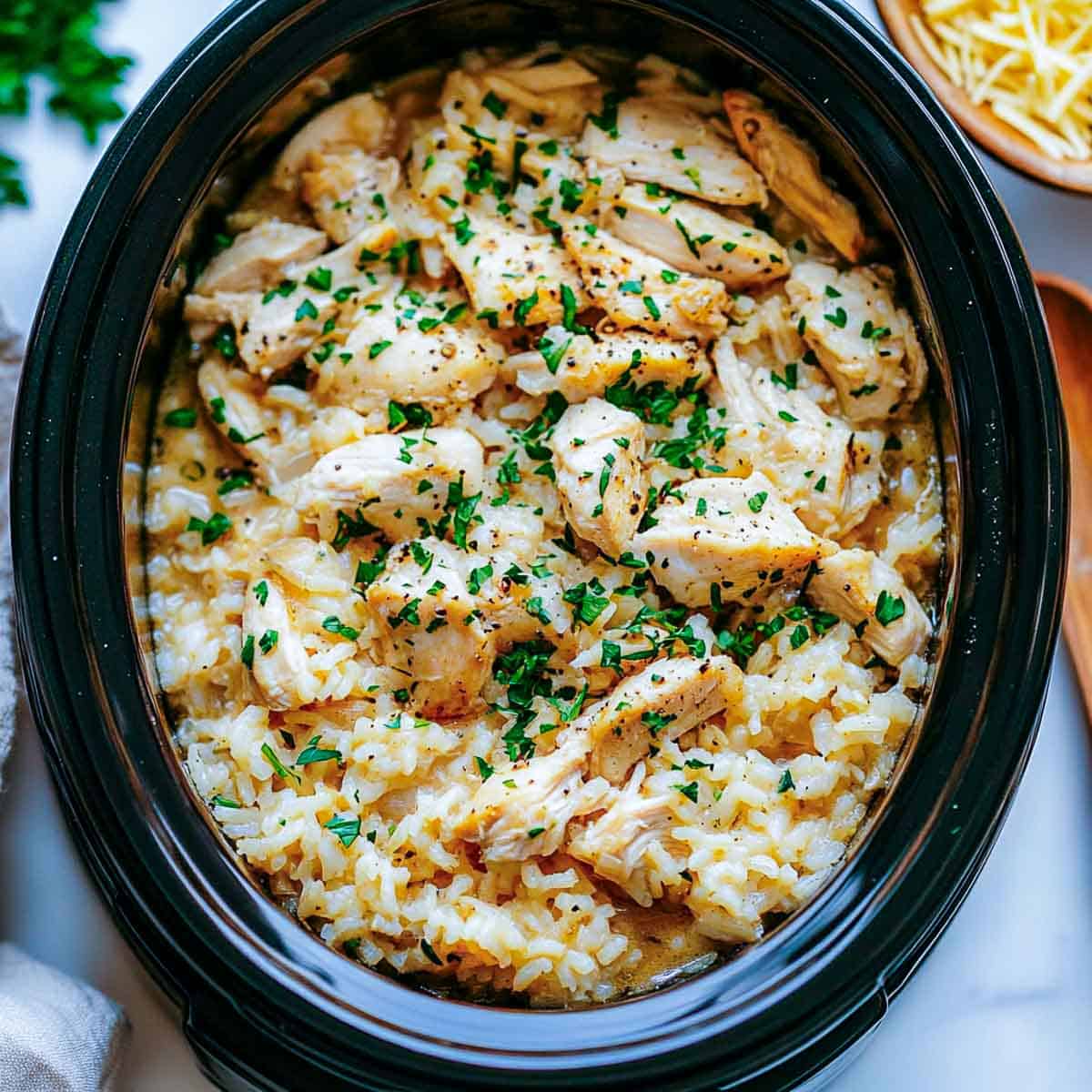 Perfectly cooked chicken and rice in the crockpot.