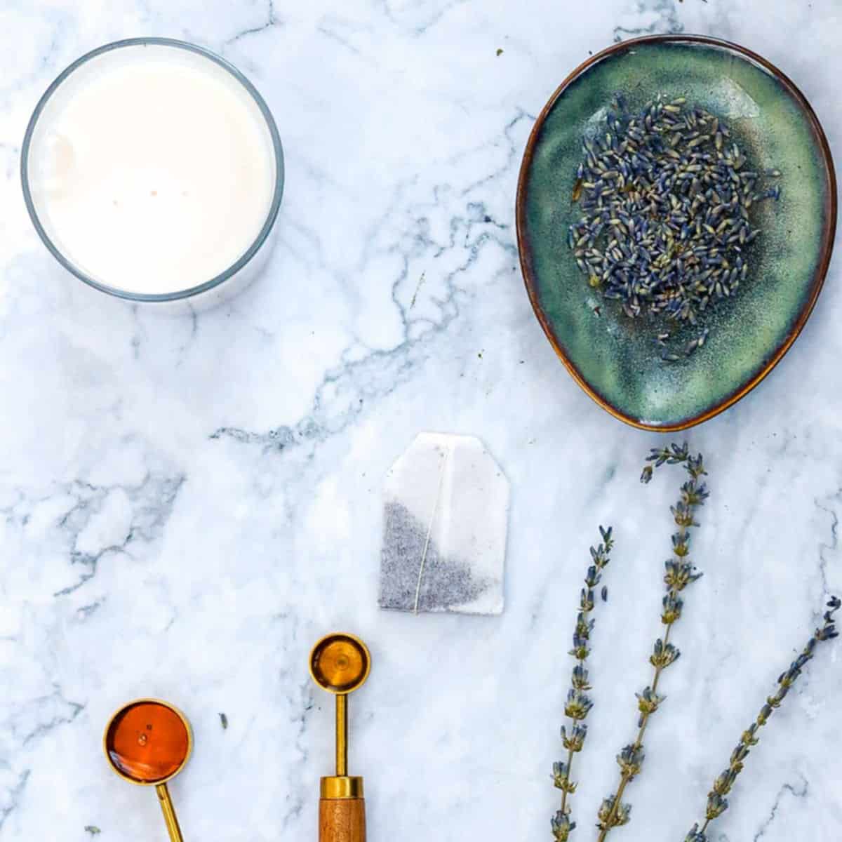 Ingredients placed on a marble surface.