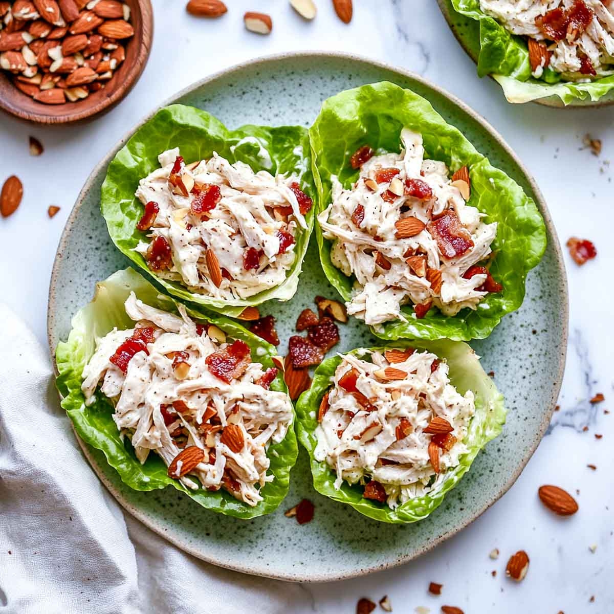 Lettuce cups on a marble surface.