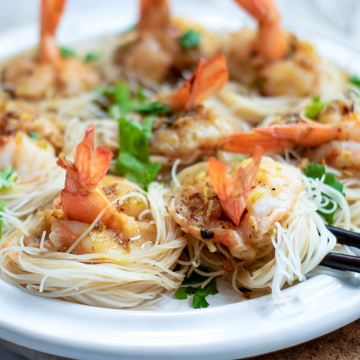 Shrimp boats on a white serving plate.