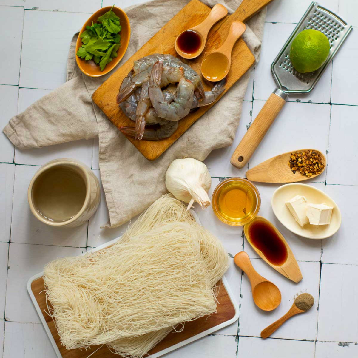 Ingredients placed on a white surface.