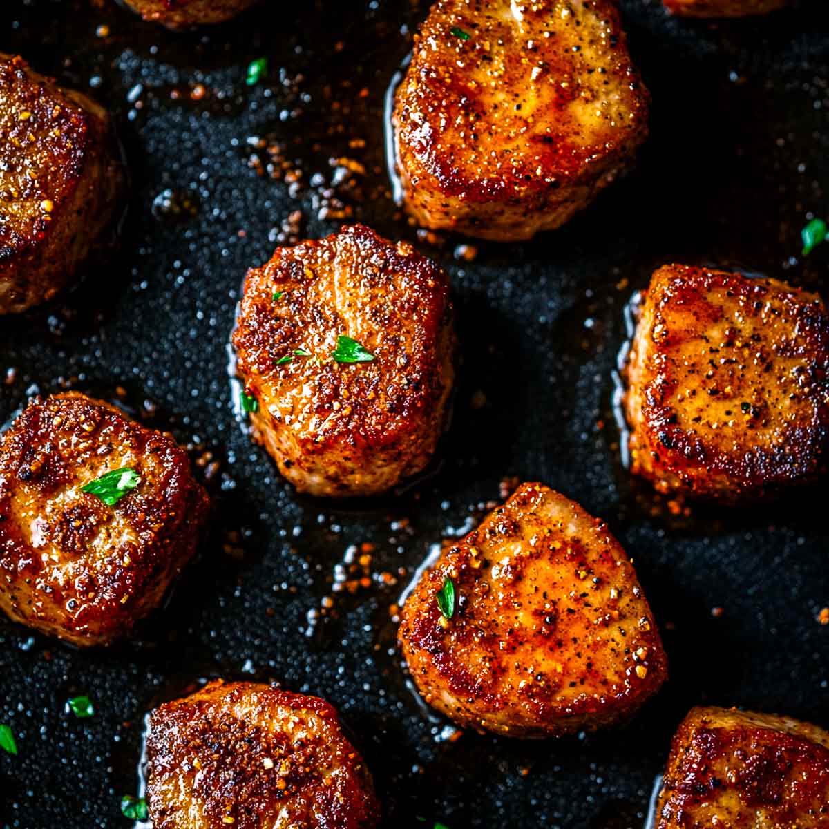 Close up of pork chop bites made on a blackstone griddle.