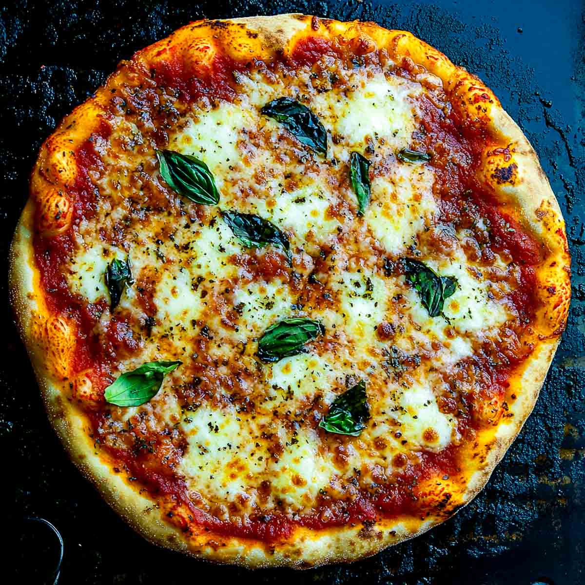 Close up of crispy blackstone camping pizza.