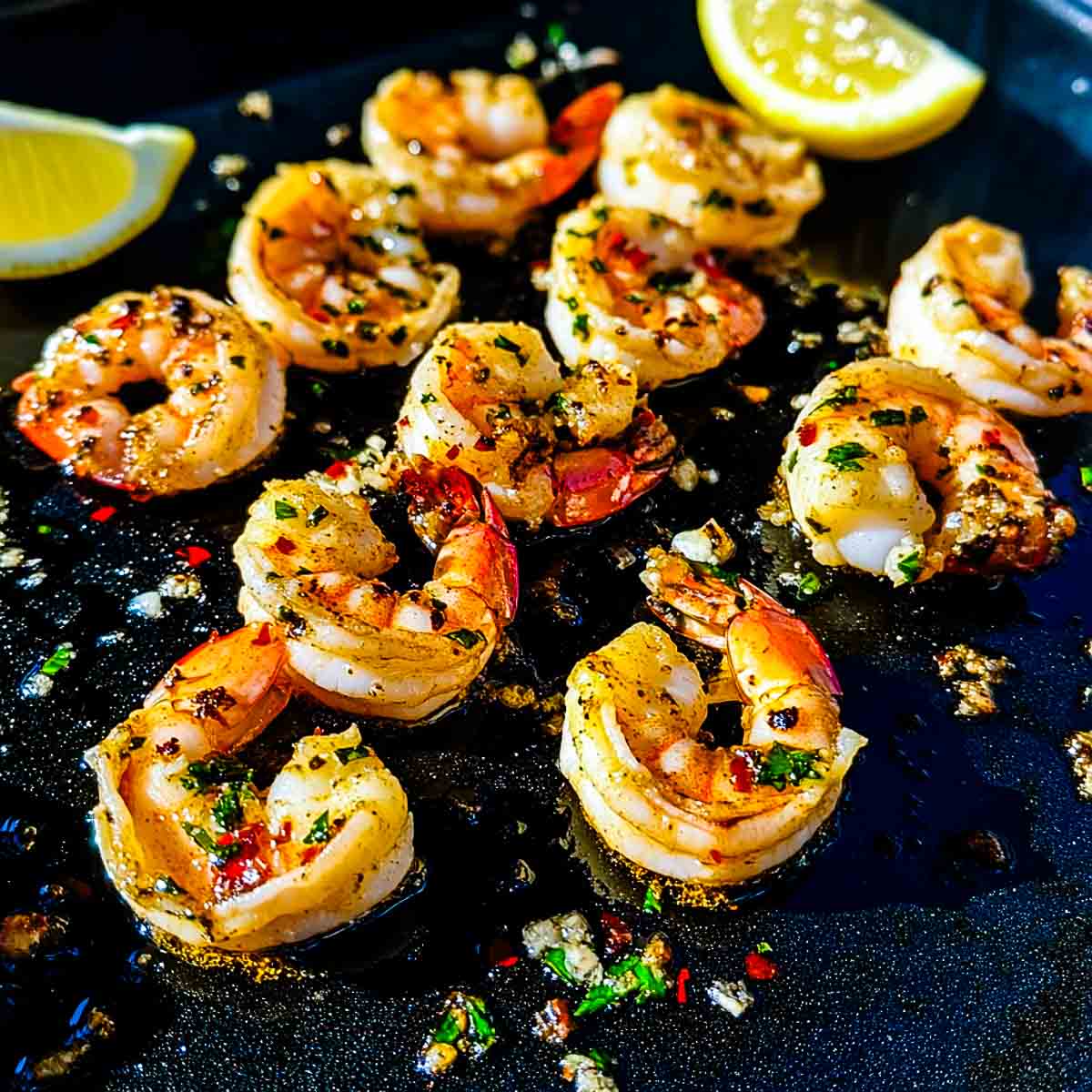 Shrimp scampi cooked on a blackstone griddle.