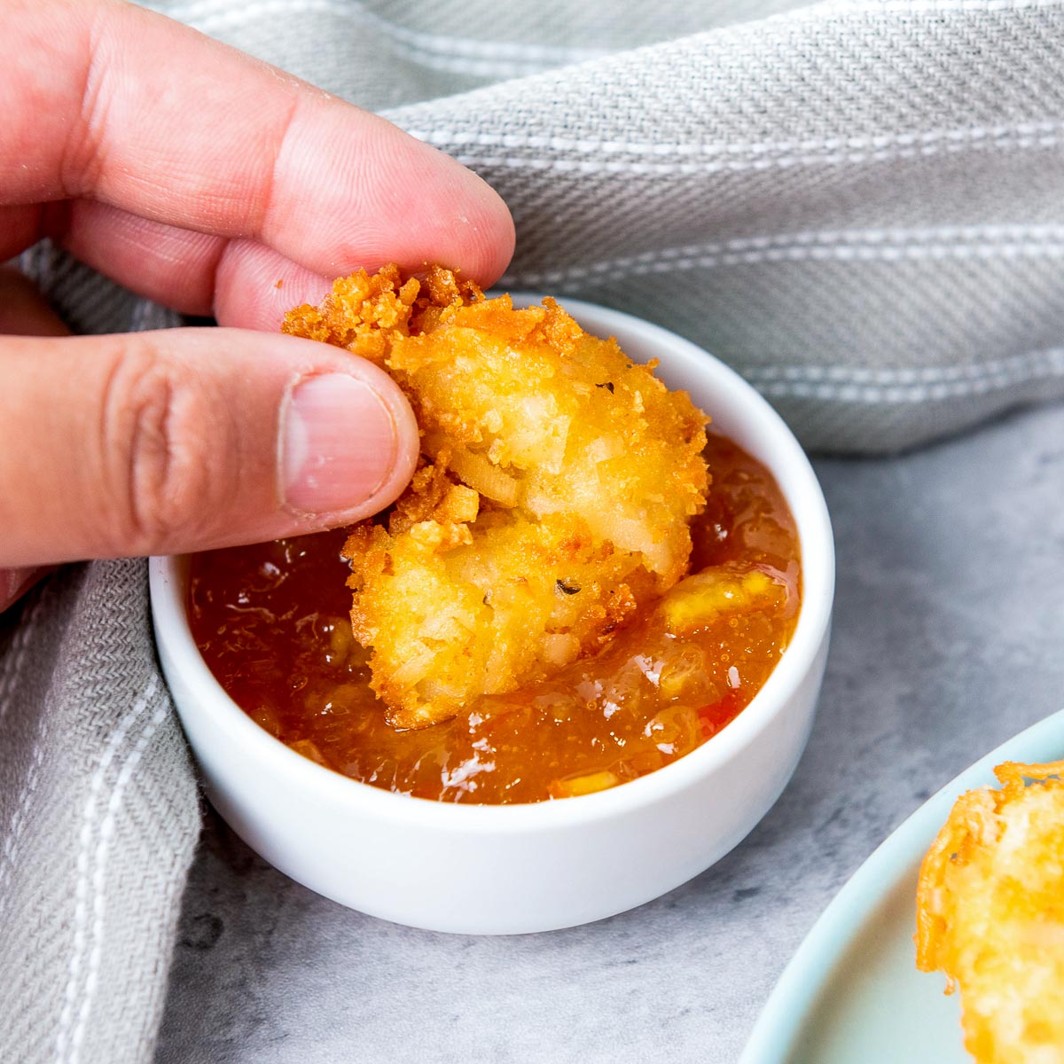 Coconut shrimp dipped in chili orange sauce.