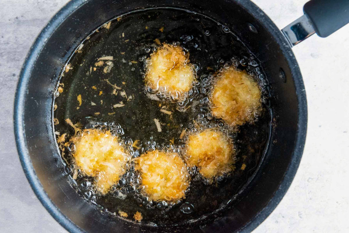 Hot oil in a saucepan for deep frying.