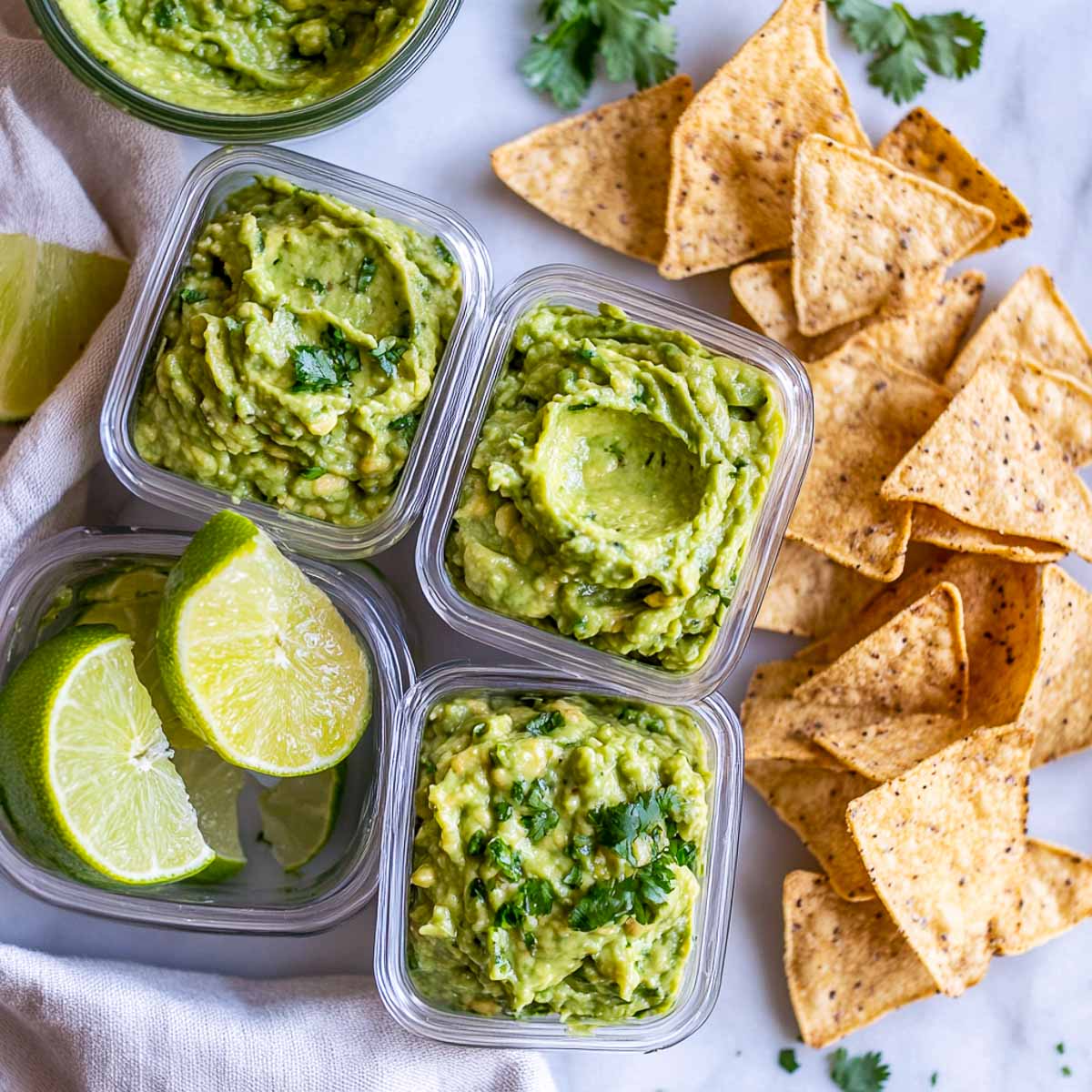 Guacamole in single serving bowls.