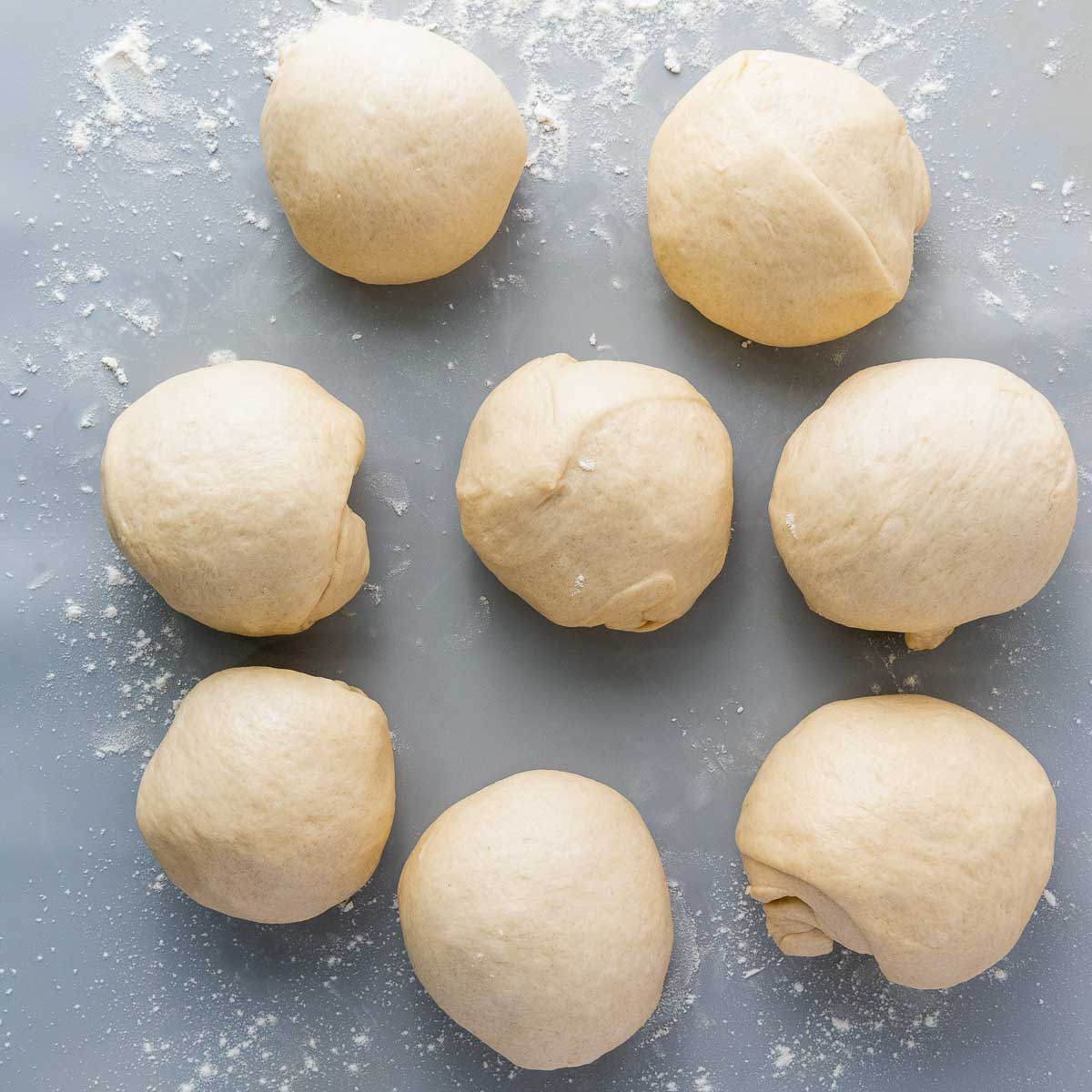 Dough divided into equal parts and rolled.