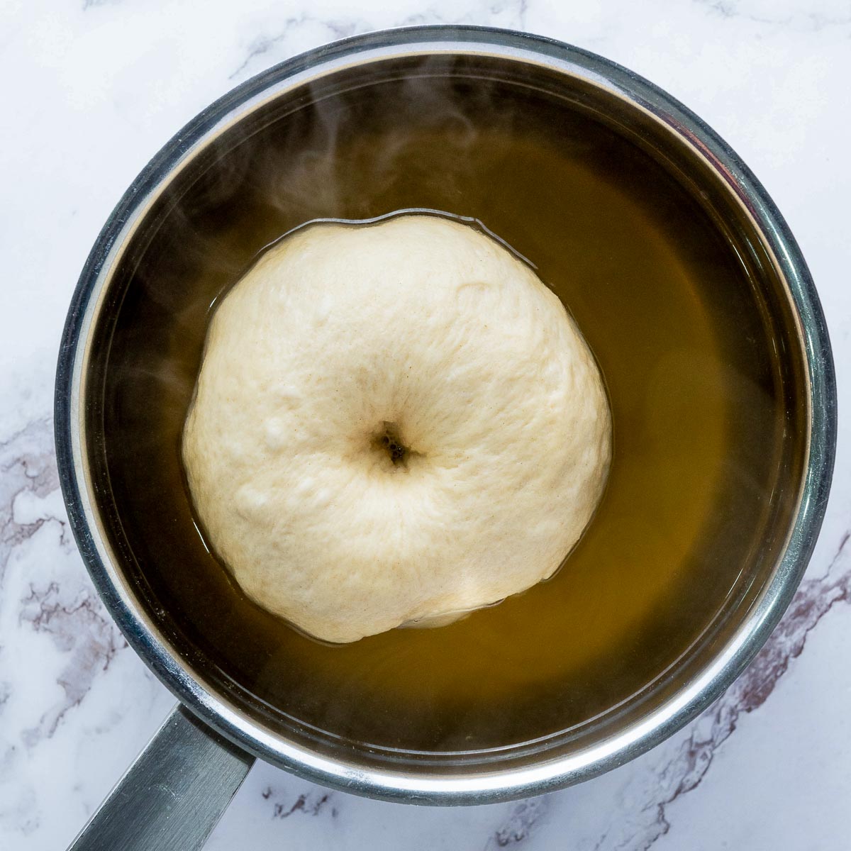 Shaped dough boiled in honey-water mixture.