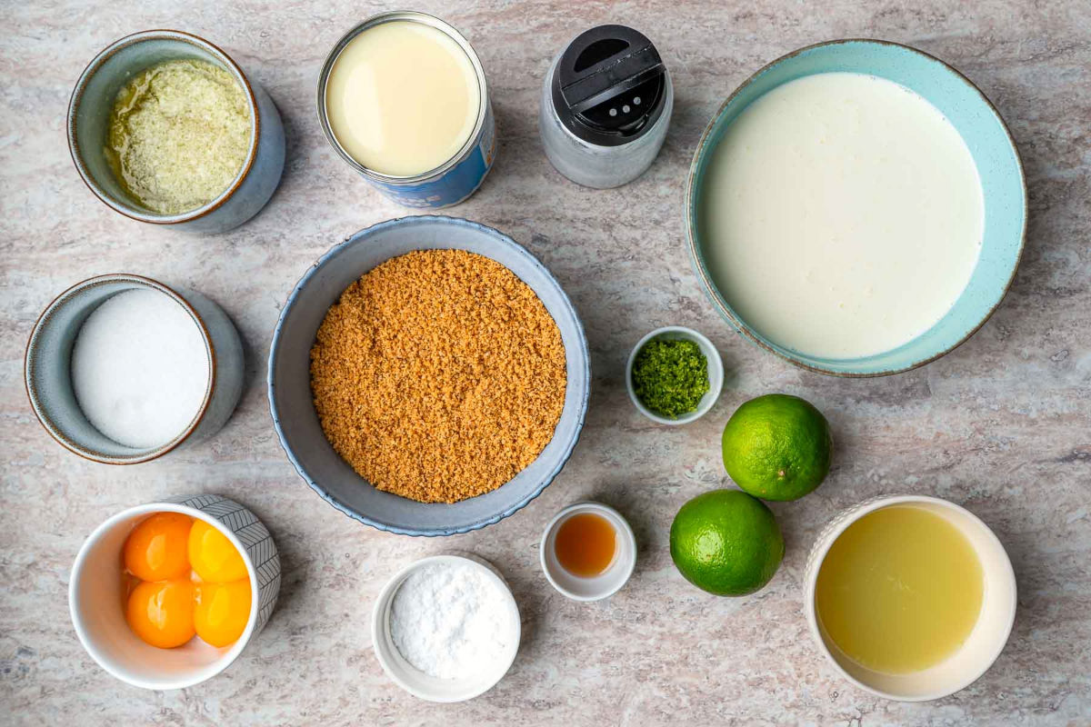 Ingredients placed on a grey surface.