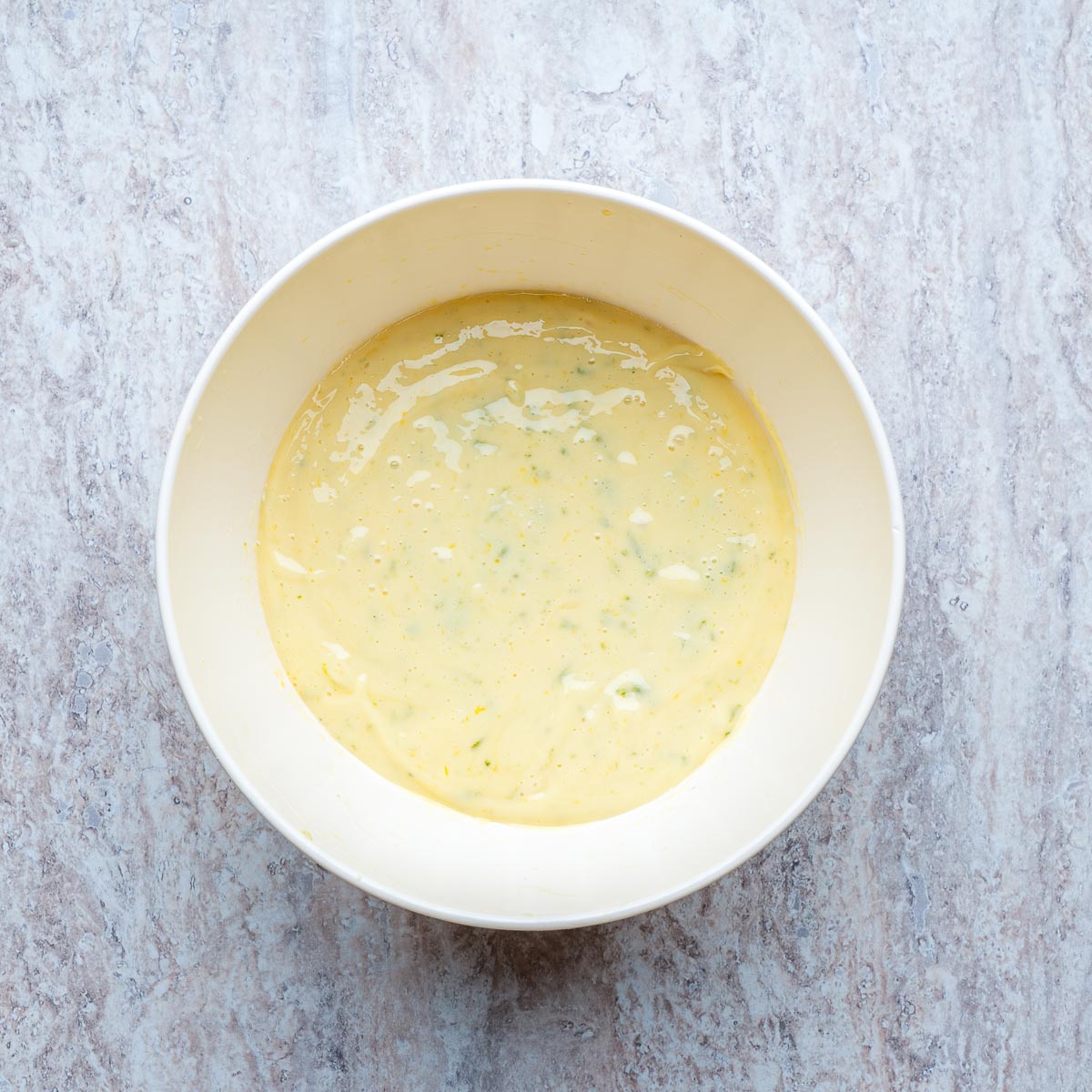 Filling ingredients whisked together in a bowl.