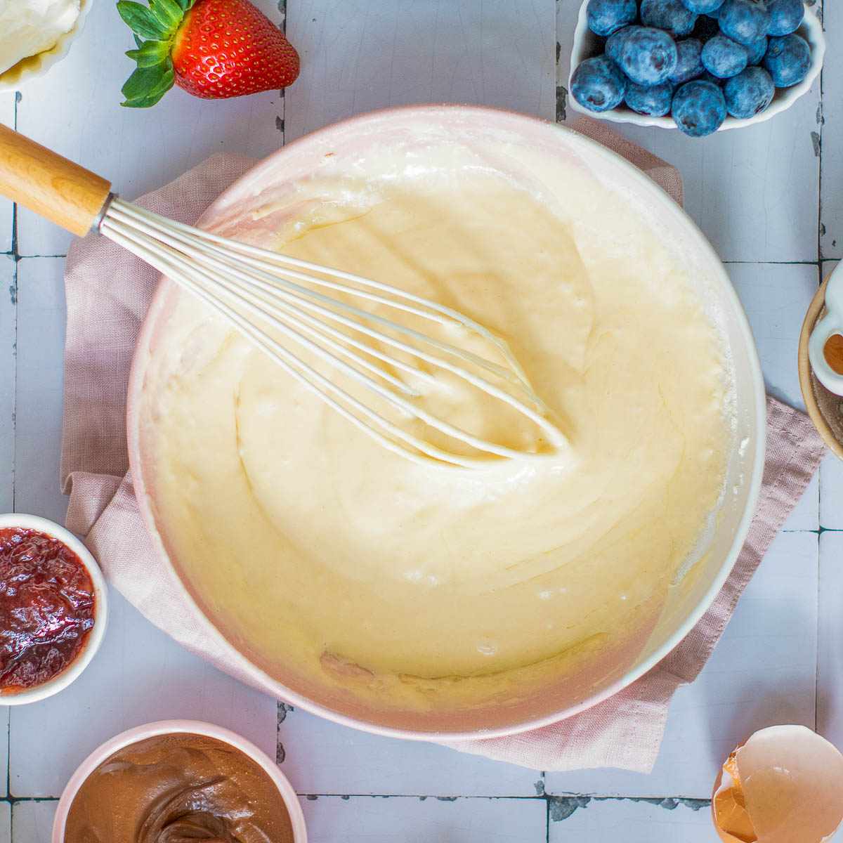 Waffle batter in a mixing bowl.