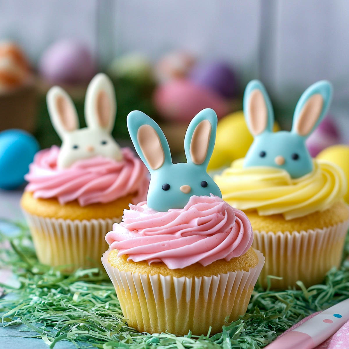 Cupcakes showing half the bunny face to make a peek-a-boo effect.