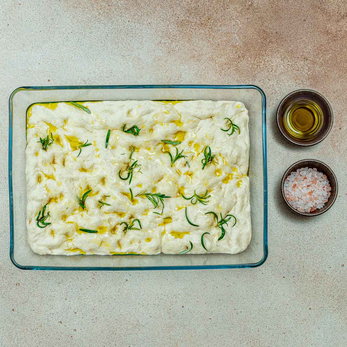 Second rise and topped with rosemary and sea salt.
