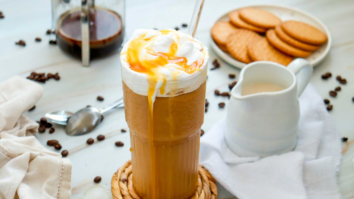 Caramel iced coffee in a glass social media image.