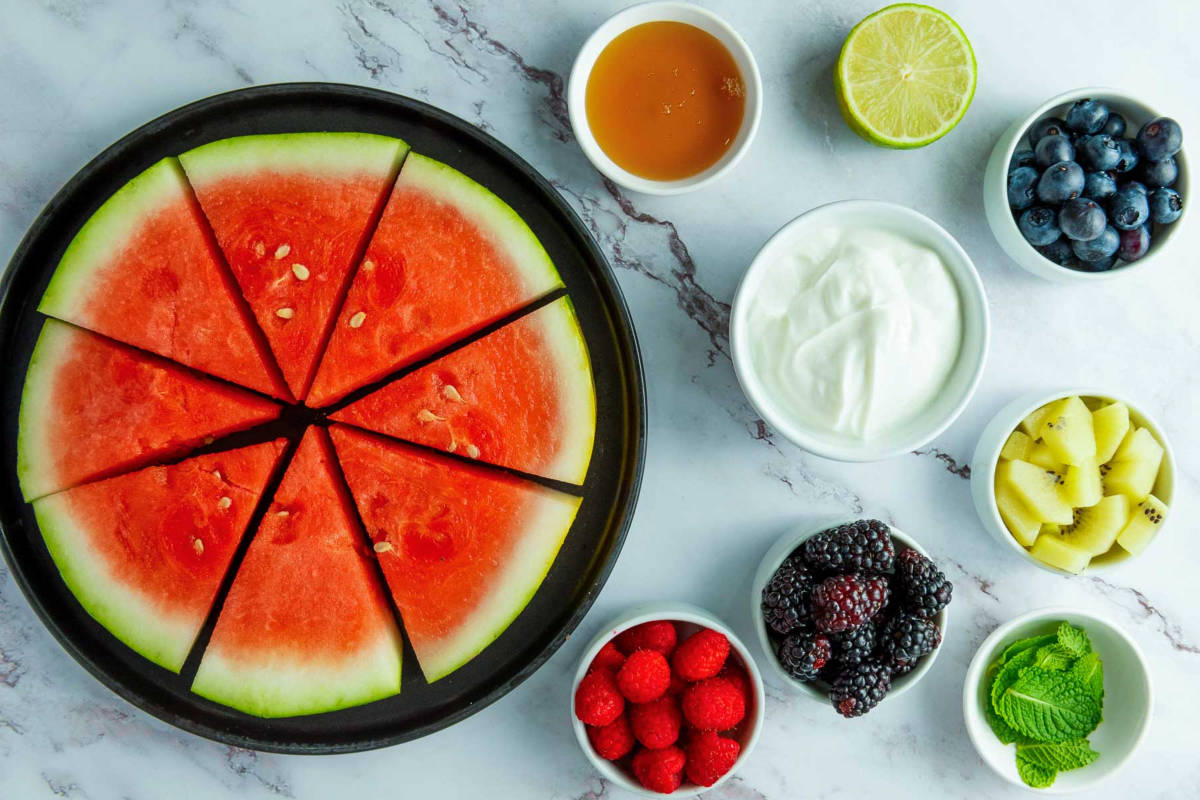 Ingredients placed on a white marble surface.