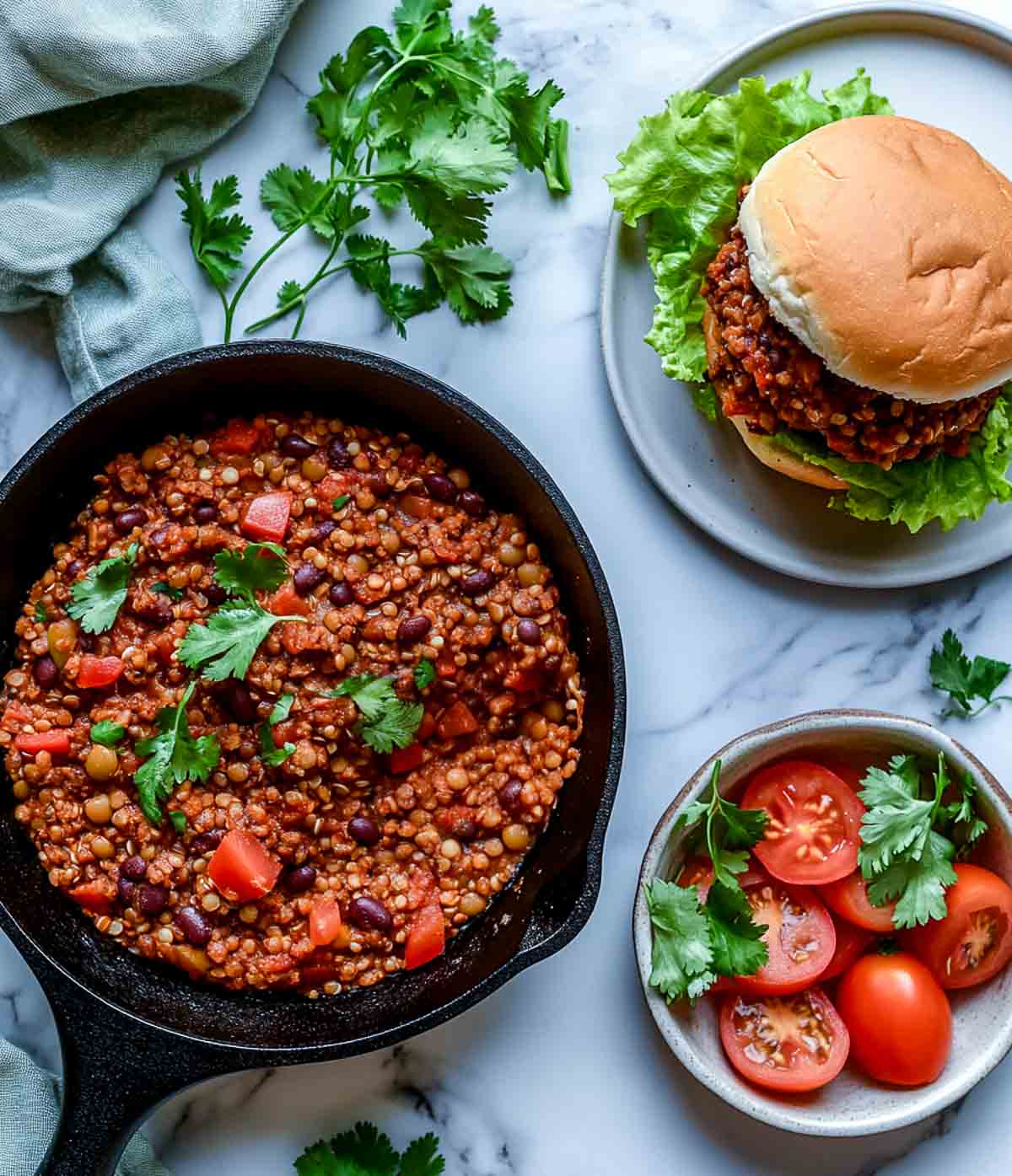 Various vegan camping meals placed on a marble surface.