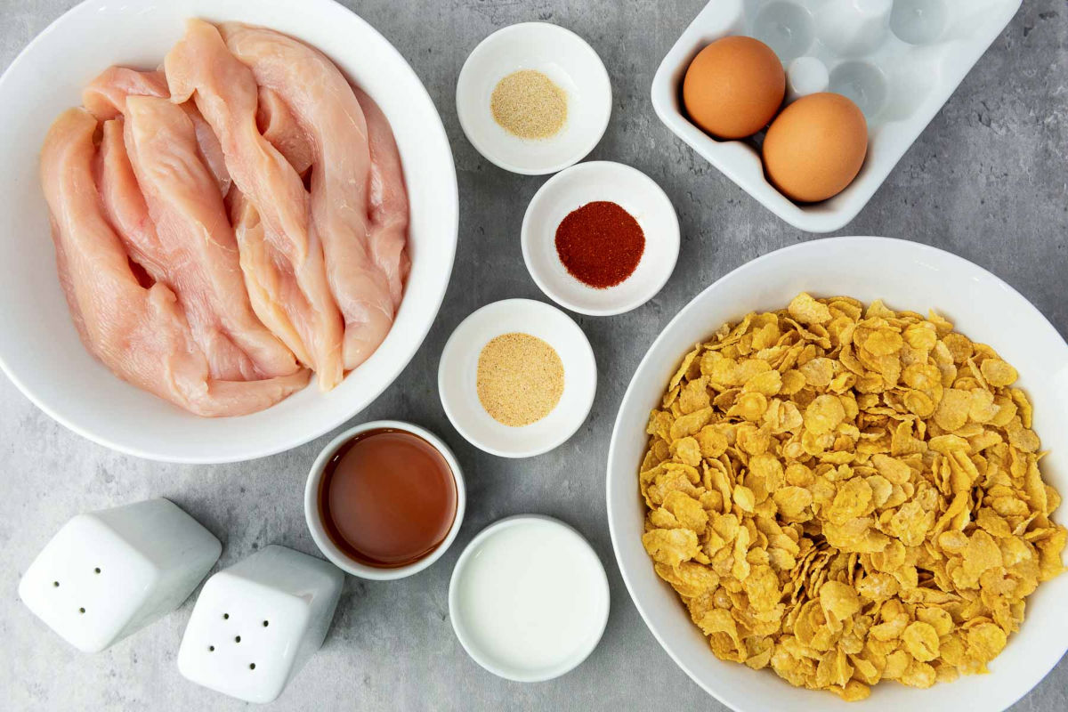 Ingredients placed on a grey surface.
