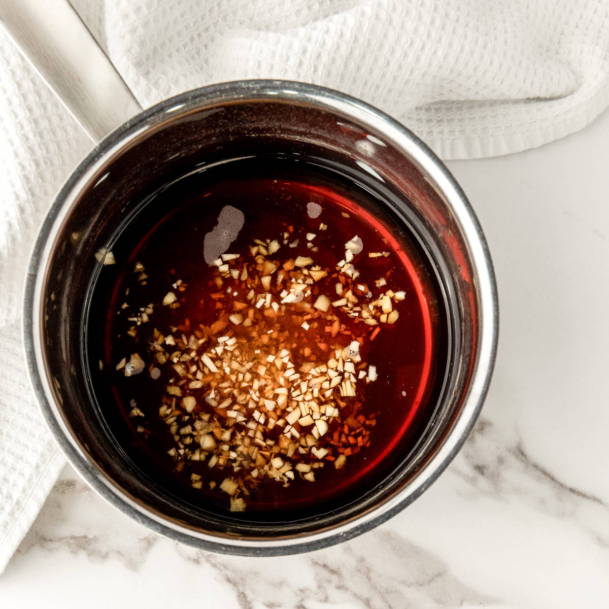 Teriyaki sauce cooked in a saucepan.