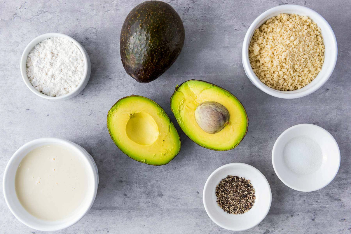 Ingredients placed on a grey surface.