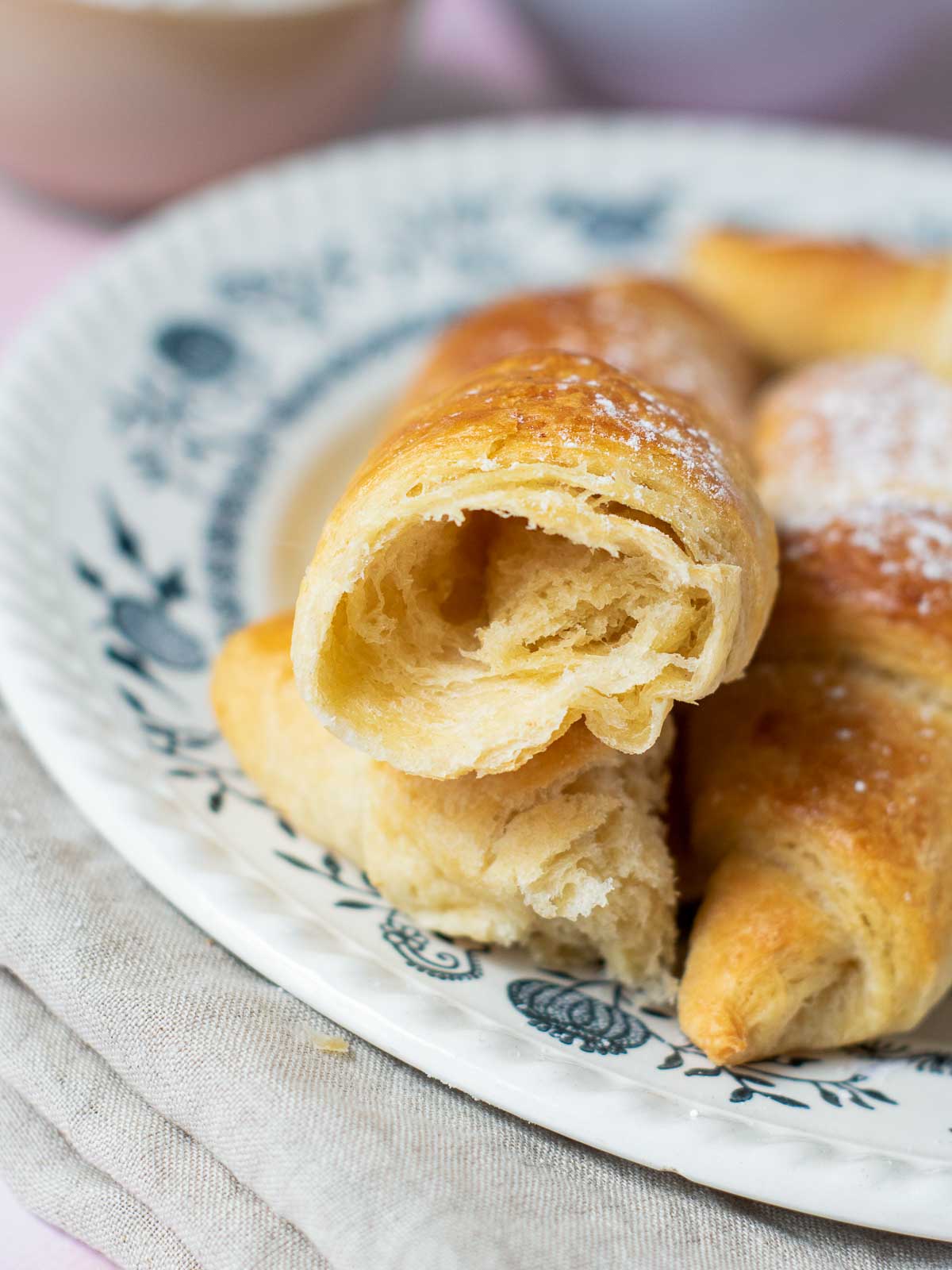 Close up of inside of a croissant to show the layers.