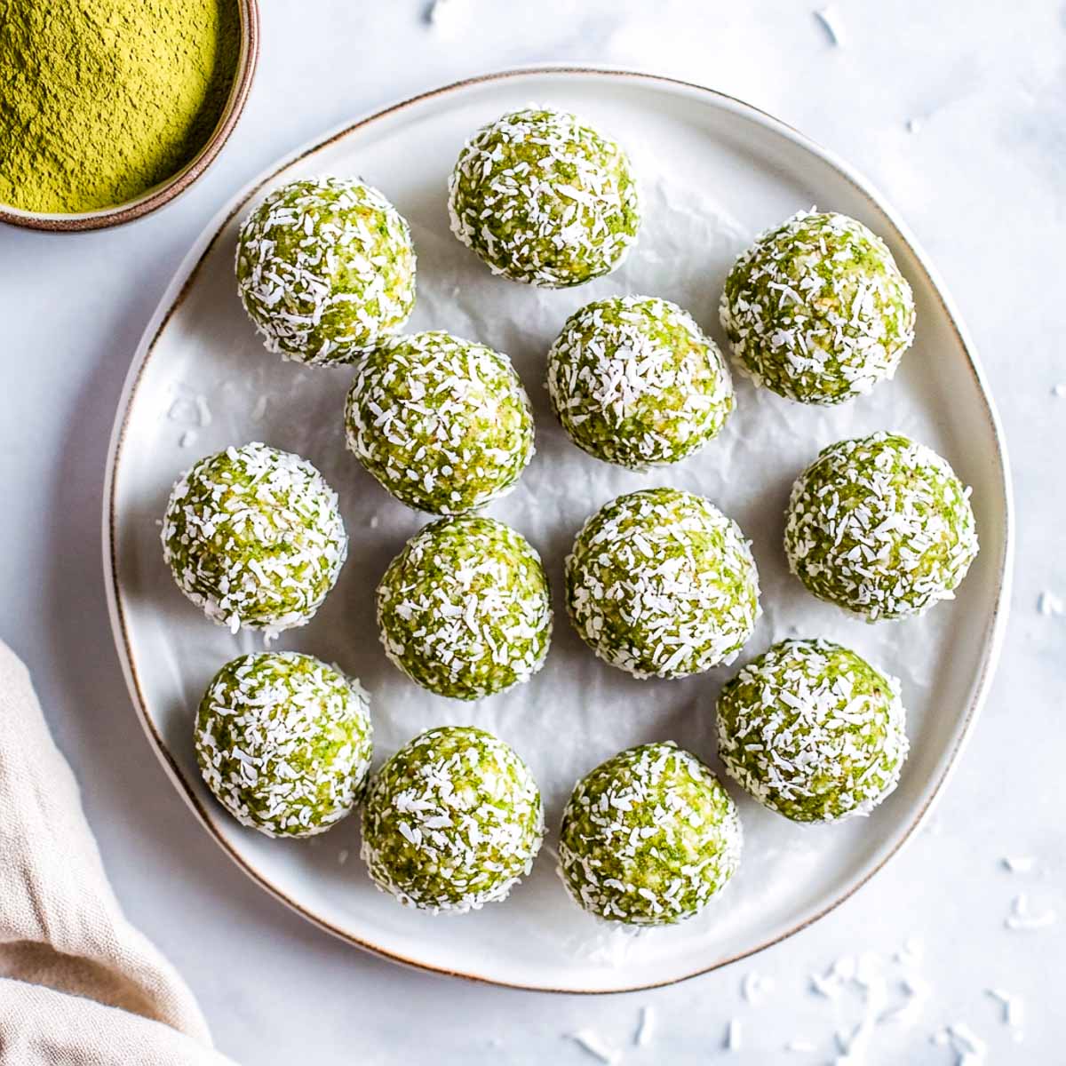 Matcha balls rolled in shredded coconut.