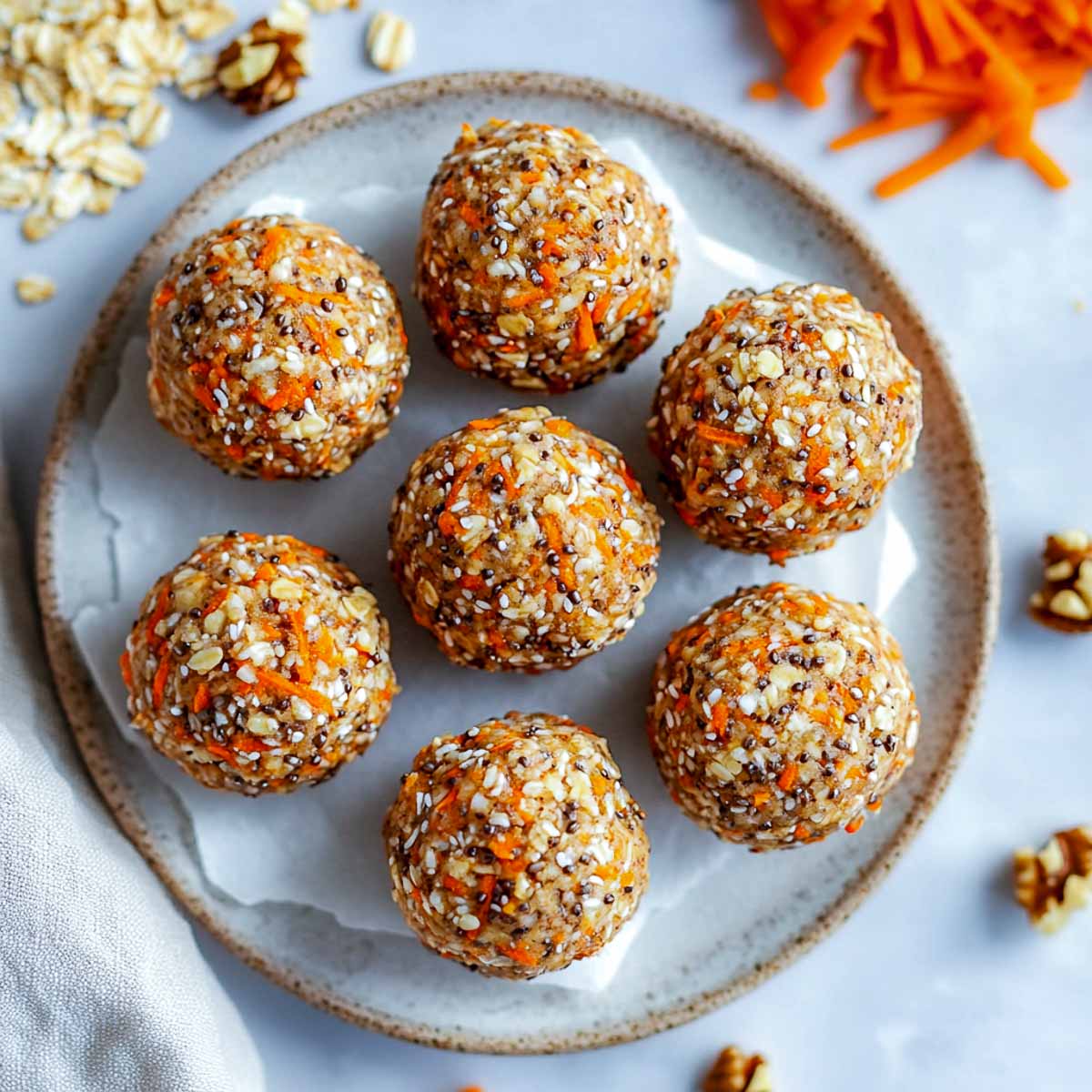 Carrot cake protein bites rolled into balls.