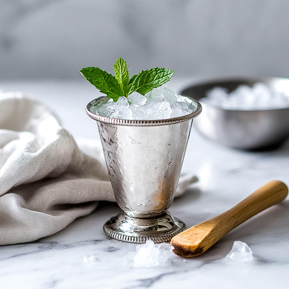 Mint julep mocktail in a classic serving glass.