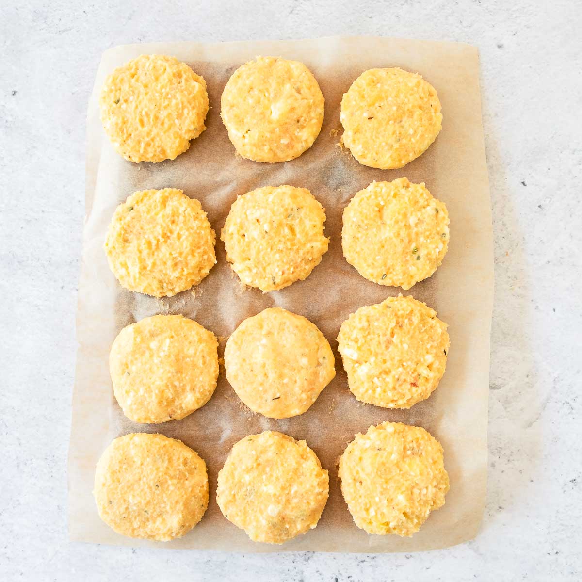 Mixed dough shaped into patties.