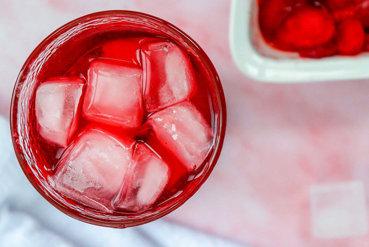Glass topped with ice for serving.