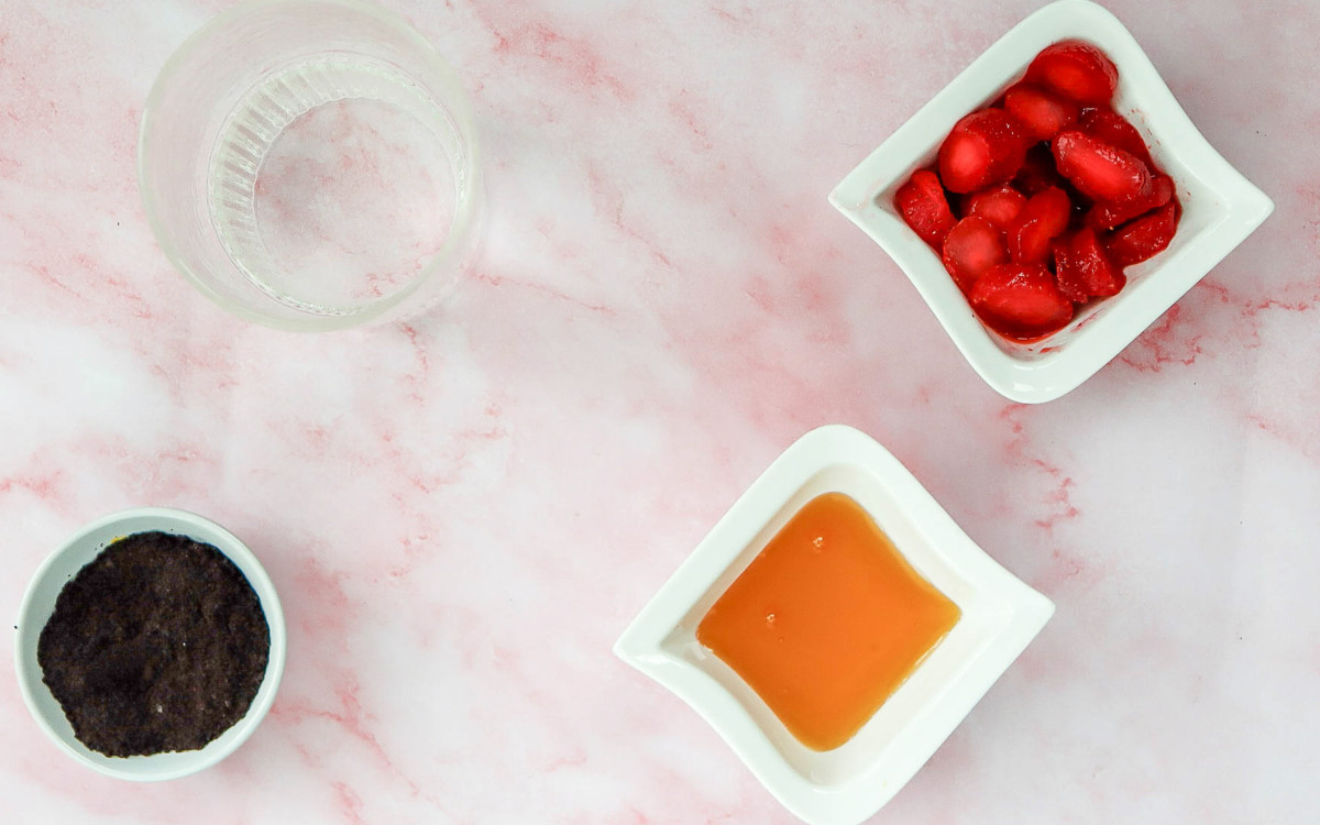 Ingredients placed on a pink marble surface.
