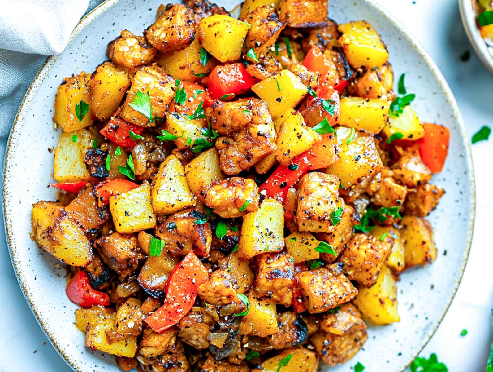 Landscape image of tempeh breakfast hash.